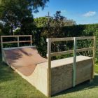 3ft mini ramp (half pipe skateboard ramp) unpainted with hand rails in garden