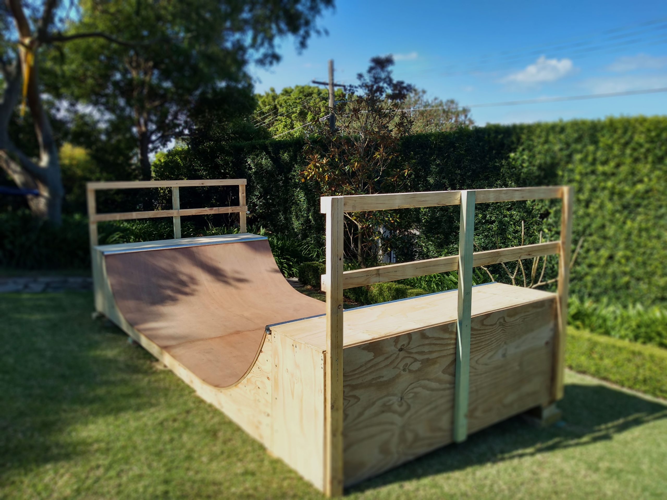 3ft mini ramp (half pipe skateboard ramp) unpainted with hand rails in garden