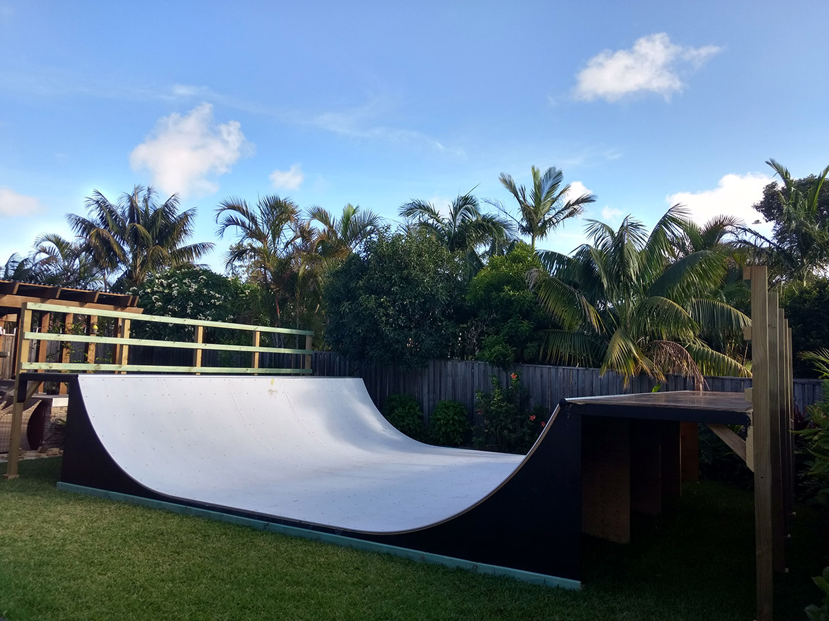 4ft mini ramp (half pipe skateboard ramp) in backyard