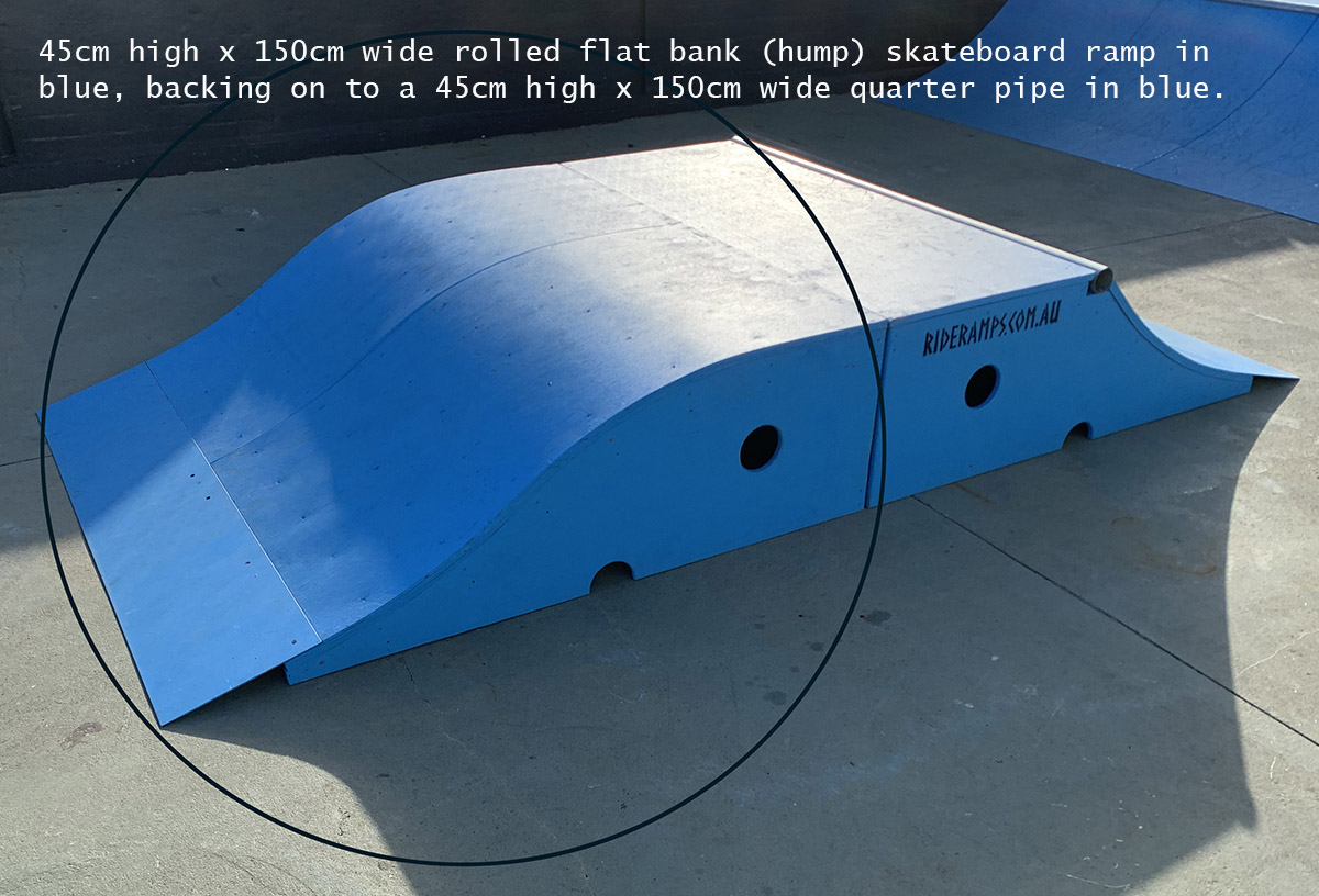45cm high rolled flat bank (hump) skateboard ramp in blue in a pop up skate park