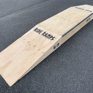 20cm high double launch ramp (wedge skateboard ramp) - grind pad (manual pad-grind box) combo in raw timber, diagonal view.