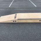 20cm high launch ramp - grind pad combo (wedge skateboard ramp plus manual pad-grind box) side view