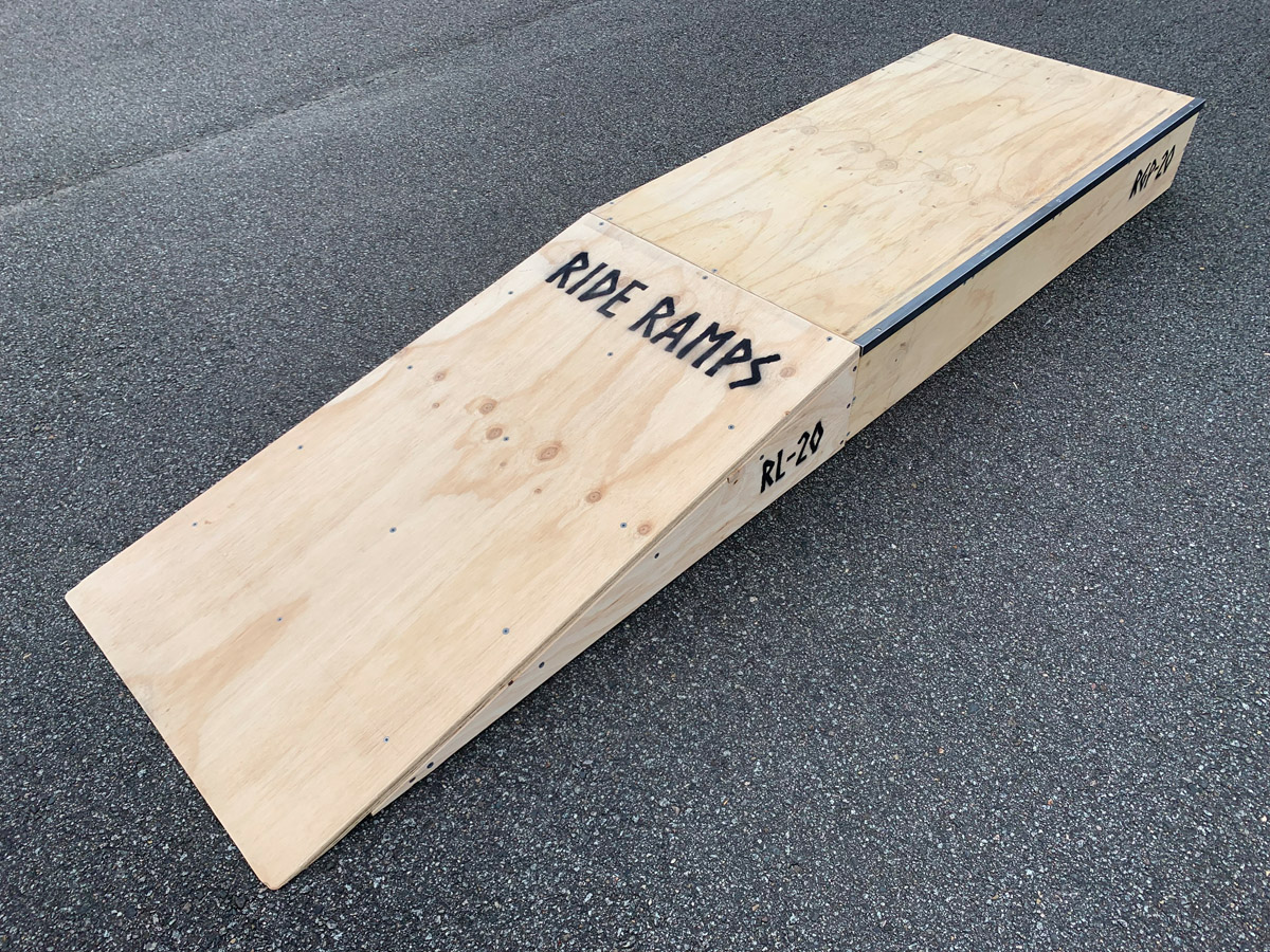 20cm high launch ramp - grind pad combo (wedge skateboard ramp plus manual pad-grind box) diagonal view