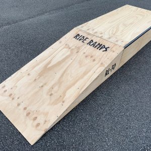 30cm high launch ramp - grind pad combo (wedge skateboard ramp plus manual pad-grind box) diagonal view